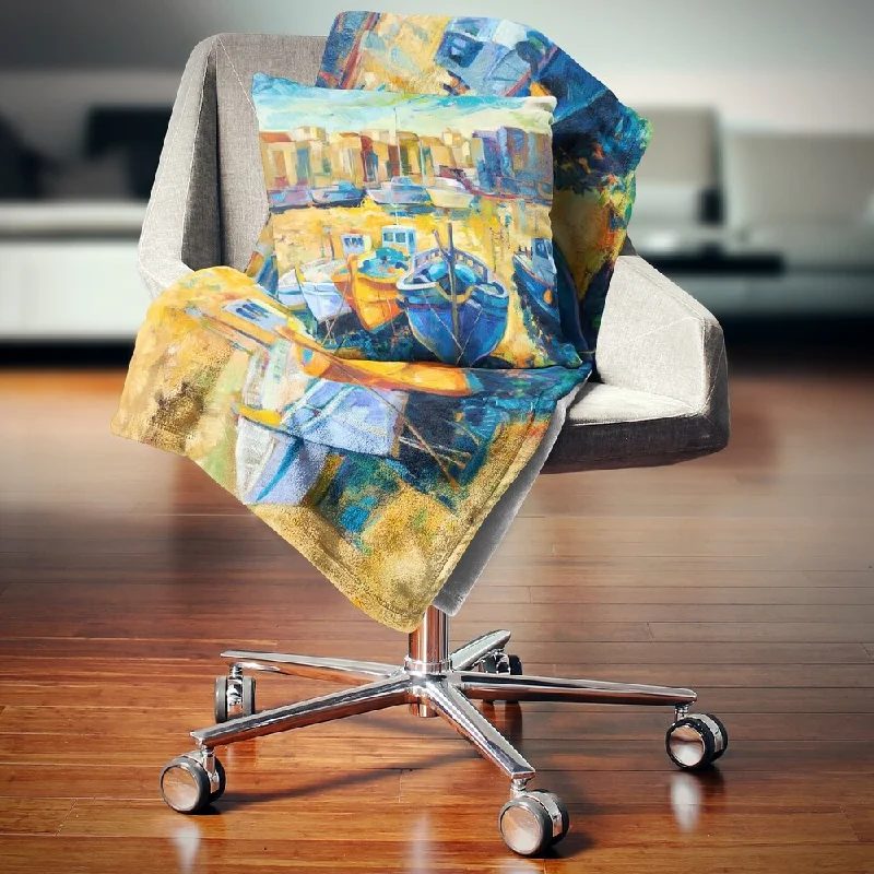 Chenille blankets with a thick and fuzzy textureChenille blankets with a thick and fuzzy textureDesignart 'Wharf and Boats' Seascape Throw Blanket