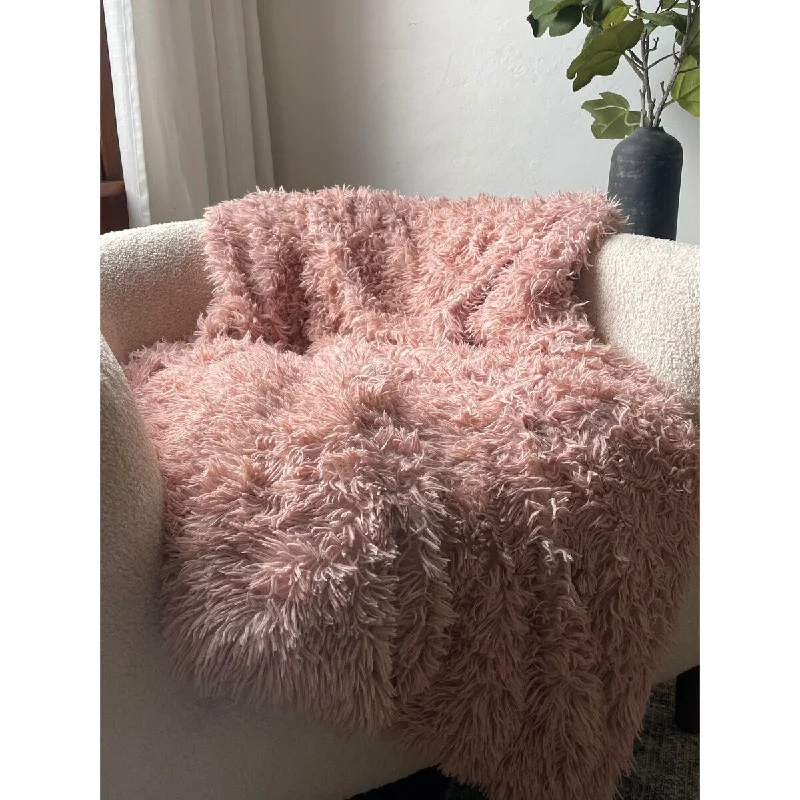 Recycled polyester blankets for an eco - conscious optionRecycled polyester blankets for an eco - conscious optionLaurel & Mayfair Pink Shaggy Faux Fur Throw, 50x60"