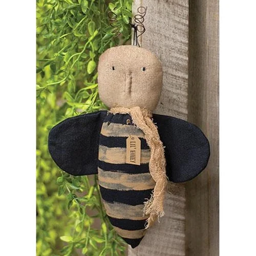 Bed skirts in pastel shades for a delicate lookLil' Honey Bee Doll