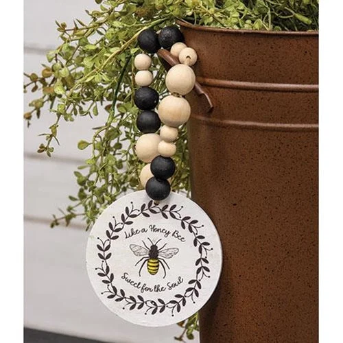 Bed skirts with a unicorn - themed print for kids' bedsHoney Bee Bead Hanger Sign