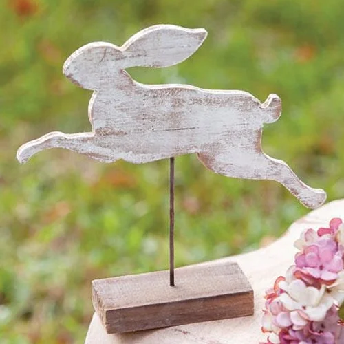Bed skirts with a modern art - inspired printDistressed Wood Bunny on Post